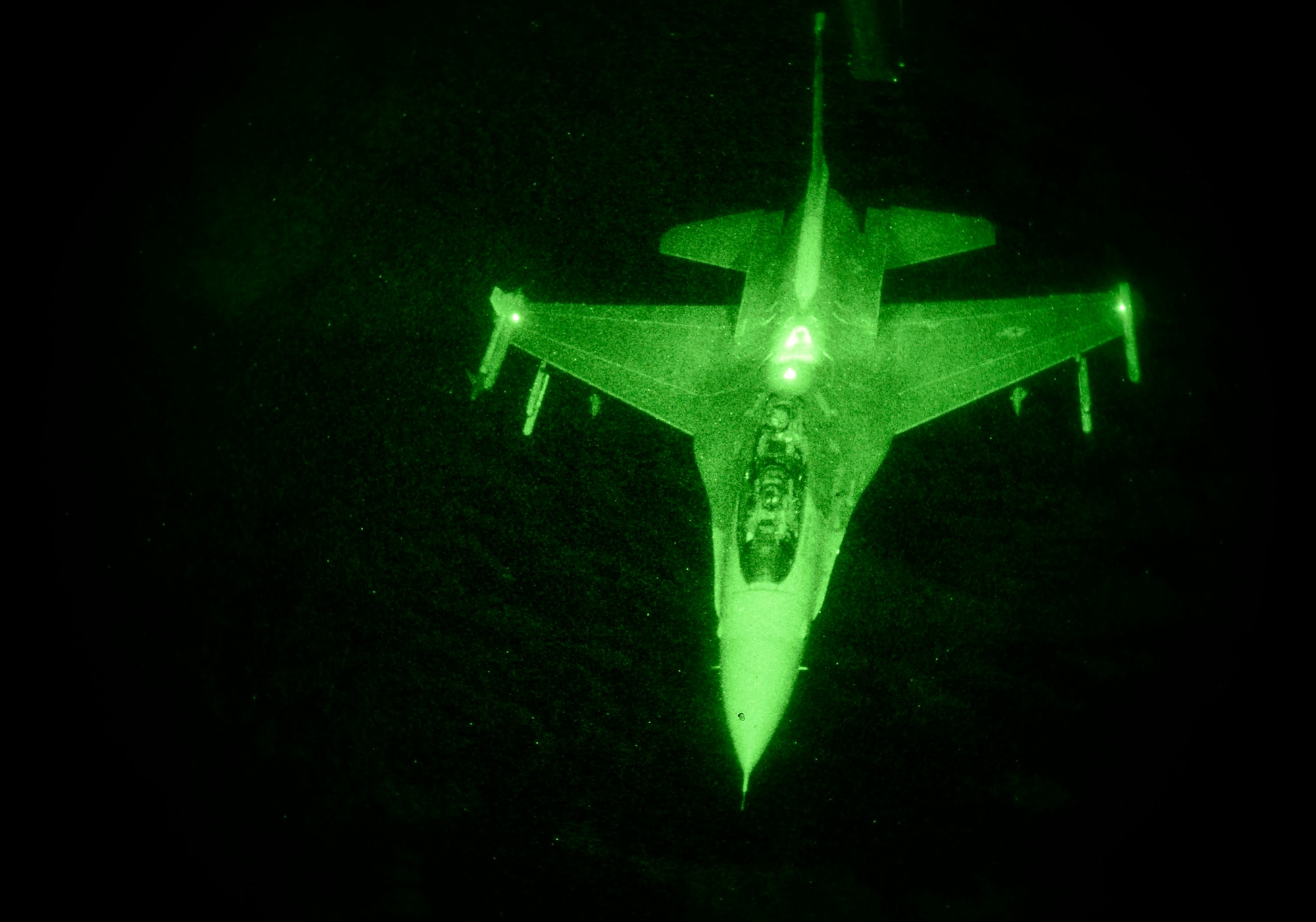 An F-16 Fighting Falcon participates in a refueling mission out of Luke Air Force Base, Ariz., Nov. 16, 2016. F-16 pilots train on aerial refueling operations to be prepared for longer missions. (U.S. Air Force photo by Senior Airman James Hensley)