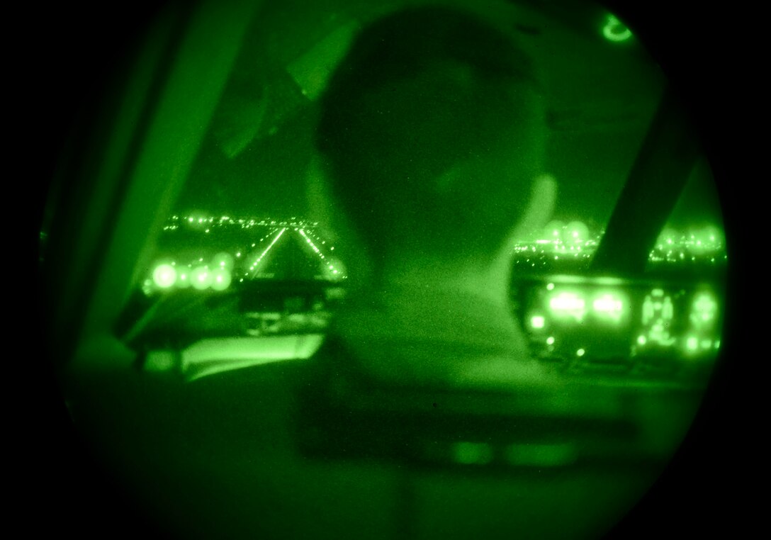 1st Lt. Justin Greenway, 70th Air Refueling Squadron pilot, approaches the runway in a KC-10 extender aircraft at Luke Air Force Base, Ariz., Nov. 16, 2016. The KC-10, from Travis Air Force Base, Calif. flew in support of the F-16 pilot training mission. (U.S. Air Force photo by Senior Airman James Hensley)