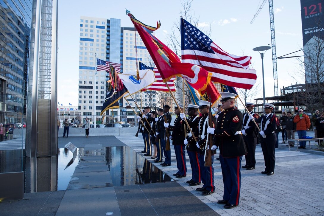 Marines from 1st Battalion, 25th Marine Regiment, 4th Marine Division, present the colors along with the Boston Fire Department and color guards from different military service branches during a Veterans Day wreath laying ceremony at the Massachusetts Fallen Heroes Memorial in Boston, Nov. 11, 2016. The ceremony was part of a series of events celebrating the Marine Corps Reserve Centennial.  Reserve Marines have served alongside their active duty counterparts in every clime and place for 100 years, leaving an indelible mark on the battle history of the Marine Corps. (U.S. Marine Corps photo by Cpl. Melissa Martens/ Released) 