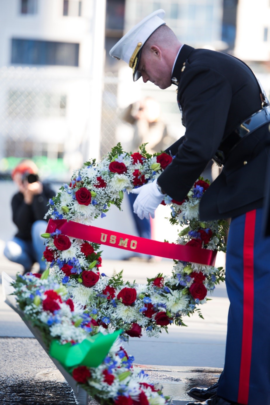 Major James F. Colvin, assistant S-3 officer, 25th Marine Regiment, 4th Marine Division, lays a wreath representing the United States Marine Corps during a Veterans Day ceremony at the Massachusetts Fallen Heroes Memorial in Boston, Nov. 11, 2016. During the ceremony, five wreaths were laid at the foot of the memorial to represent each branch of the military. The ceremony was part of a series of events celebrating the Marine Corps Reserve Centennial.  Reserve Marines have served alongside their active duty counterparts in every clime and place for 100 years, leaving an indelible mark on the battle history of the Marine Corps.(U.S. Marine Corps photo by Cpl. Melissa Martens/ Released)  