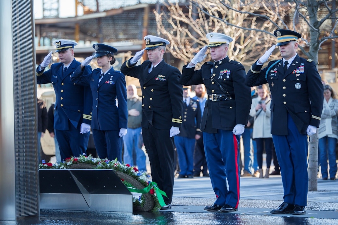 Service members from each branch of the United States Armed Forces salute the wreaths laid at the foot of the Massachusetts Fallen Heroes Memorial in Boston during a Veterans Day wreath laying ceremony, Nov. 11, 2016. The ceremony was part of a series of events celebrating the Marine Corps Reserve Centennial.  Reserve Marines have served alongside their active duty counterparts in every clime and place for 100 years, leaving an indelible mark on the battle history of the Marine Corps (U.S. Marine Corps photo by Cpl. Melissa Martens/ Released) 