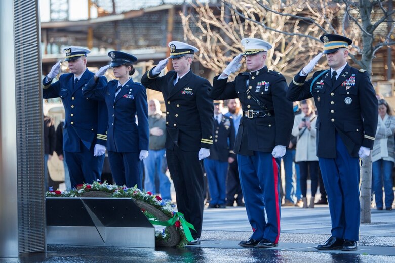 Service members from each branch of the United States Armed Forces salute the wreaths laid at the foot of the Massachusetts Fallen Heroes Memorial in Boston during a Veterans Day wreath laying ceremony, Nov. 11, 2016. The ceremony was part of a series of events celebrating the Marine Corps Reserve Centennial.  Reserve Marines have served alongside their active duty counterparts in every clime and place for 100 years, leaving an indelible mark on the battle history of the Marine Corps (U.S. Marine Corps photo by Cpl. Melissa Martens/ Released) 