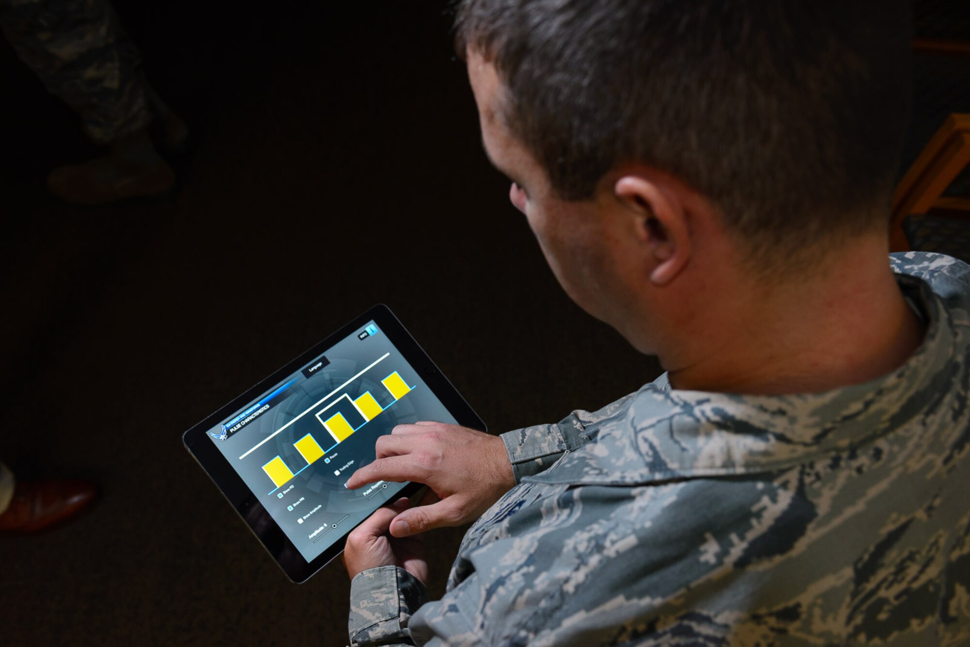 In response to frequent deployments, strains on the resources of both time and personnel, and the availability of sophisticated technological capabilities, the Air Force is increasingly looking to mobile learning. (U.S. Air Force Photo/William B. Belcher)