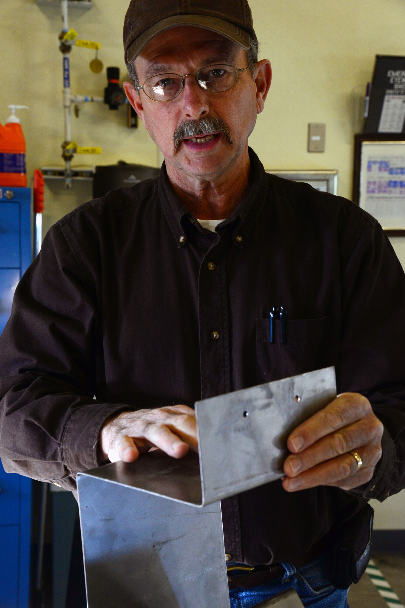 Leighton Dresch, 341st Missiles Maintenance Squadron corrosion section supervisor, explains what the corrosion shop completes in the vast missile field Nov. 1, 2016, at Malmstrom Air Force Base, Mont. Dresch is the corrosion shop supervisor and leads a team of seven individuals who maintain the sustainability of 150 launch facilities throughout the state of Montana. (U.S. Air Force photo/Airman 1st Class Magen M. Reeves)