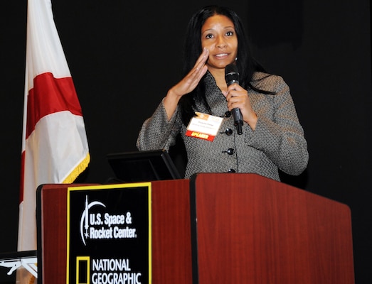 Porscha Porter, Huntsville Center’s Energy Division branch chief for Strategy and Business Management, moderates a panel focusing on federal government energy initiatives and partnerships during Energy Huntsville's Energy Summit Nov.15 at the U.S. Space and Rocket Center. 