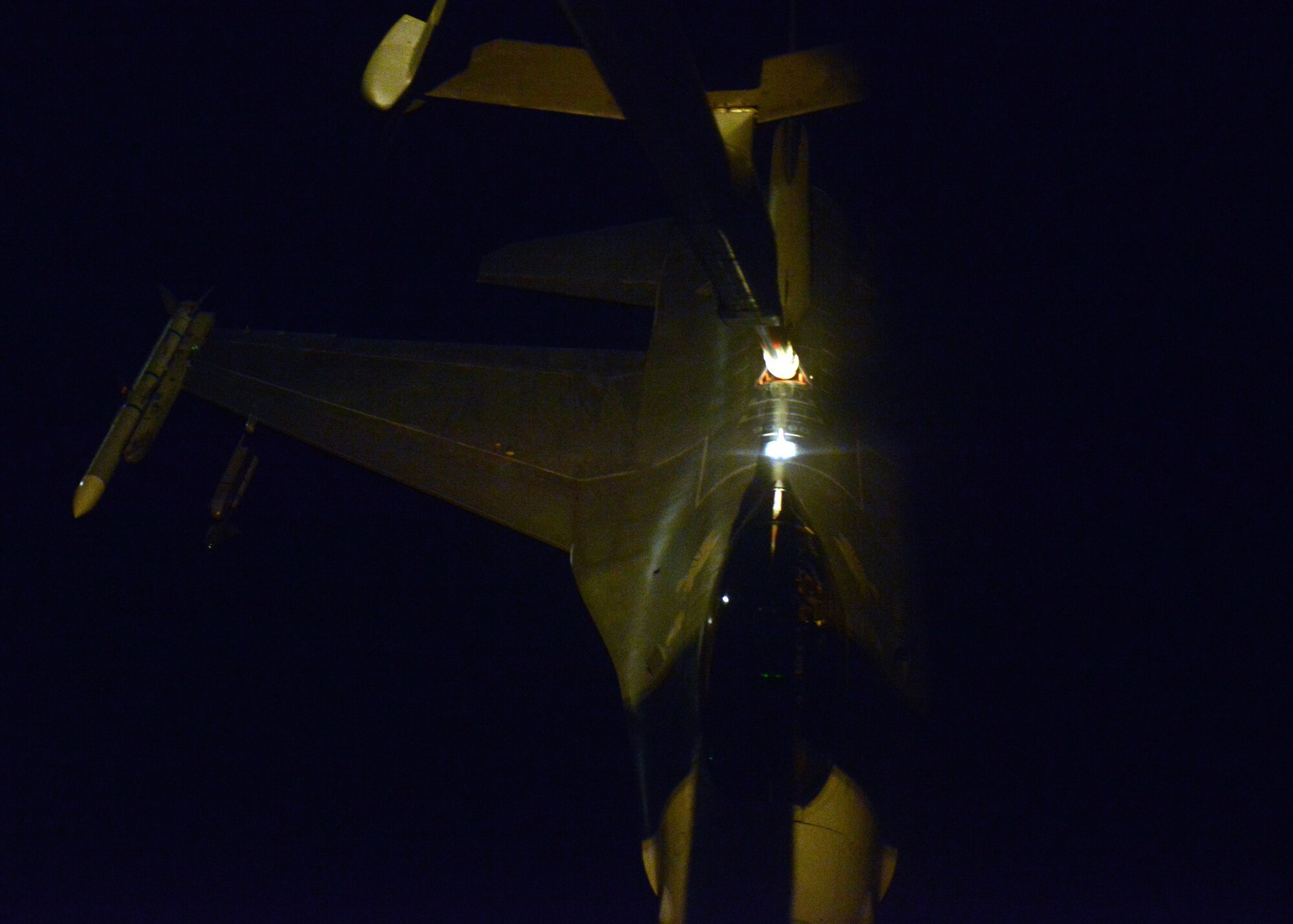 An F-16 Fighting Falcon gets refueled from a KC-10 Extender, during an aerial refueling mission Nov. 16, 2016 out of Luke Air Force Base, Ariz. F-16 pilots train on aerial refueling operations to be prepared for longer mission requirements.  (U.S. Air Force photo by Senior Airman Devante Williams)
