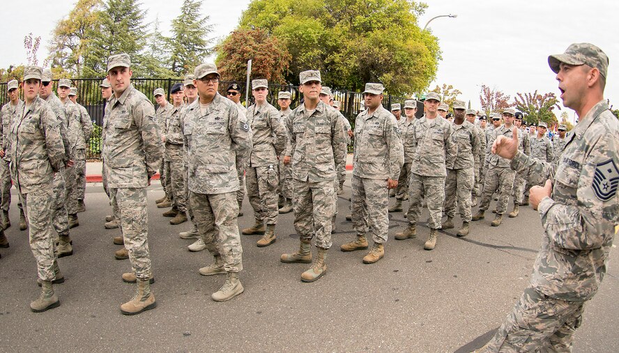 Master Sgt. William Mitchell, 60th  Civil Engineer Squadron first sergeant and squad leader, gives last-minute instructions to a formation of Airmen from Travis Air Force Base, Calif., Nov. 11, 2016, as they prepare to march through downtown Fairfield, Calif., in honor of the city’s Veterans Day Commemoration and Parade. Over 70 entries participated in the parade for more than a 1,000 spectators. (U.S. Air Force Photo by T.C. Perkins Jr.)