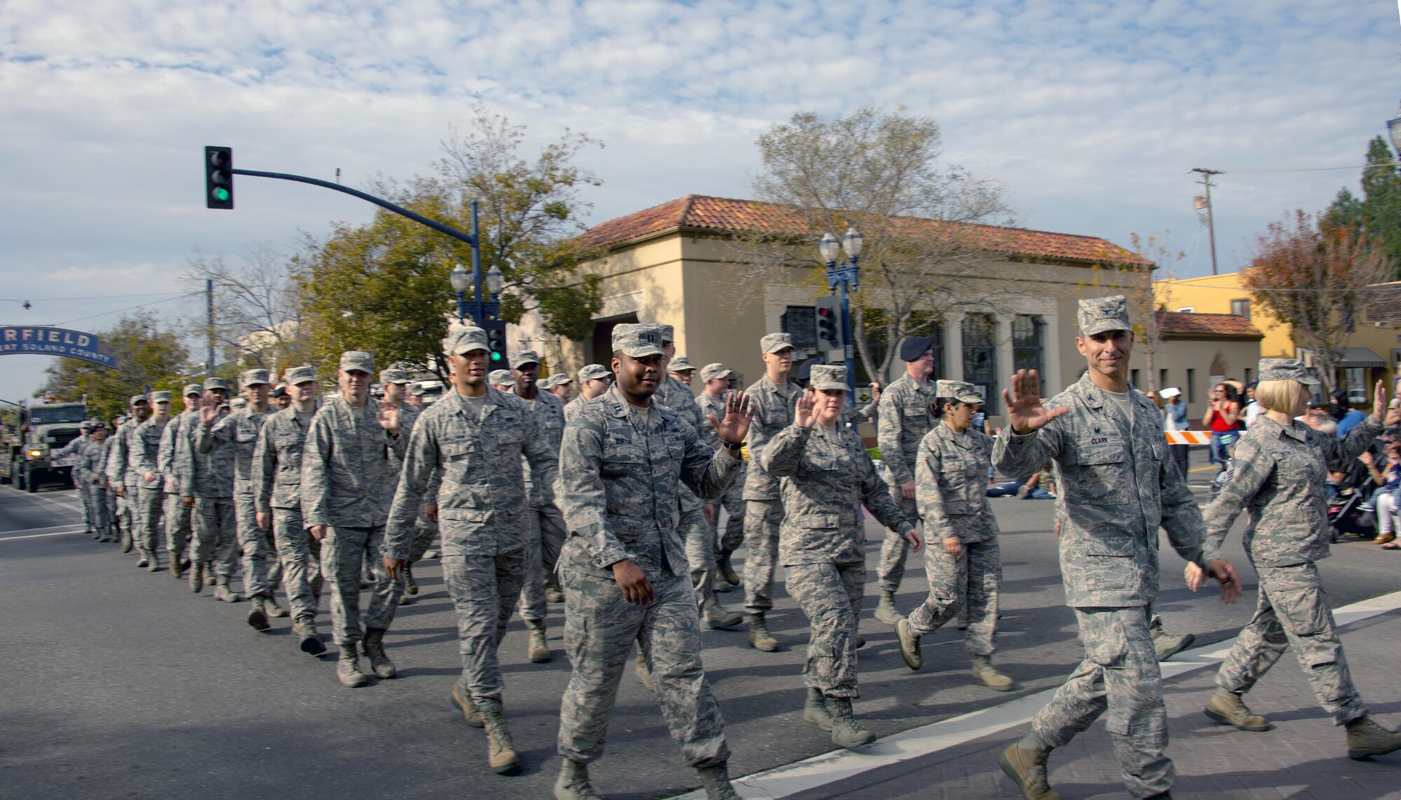 Col. Lance Clark, 60th Mission Support Group commander, (2nd from right) leads a formation of Airmen as they march through the streets of downtown Fairfield, Calif., during the city’s annual Veterans Day Parade Nov. 11, 2016. The parade also featured performances from the U.S. Air Force Band of the Golden West and a C-17 Globemaster III flyover. (U.S. Air Force Photo by T.C. Perkins Jr.)