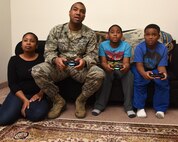 Tech. Sgt. Christopher McShan II, 341st Civil Engineer Squadron emergency management flight section chief, spends quality time with his family at their home at Malmstrom Air Force Base, Mont., Nov. 17, 2016. McShan is involved in his home life, but also work as well. (U.S. Air Force photo/Senior Airman Jaeda Tookes)


