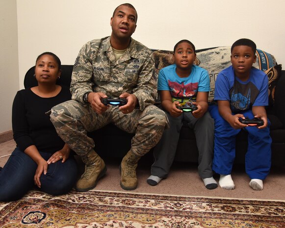 Tech. Sgt. Christopher McShan II, 341st Civil Engineer Squadron emergency management flight section chief, spends quality time with his family at their home at Malmstrom Air Force Base, Mont., Nov. 17, 2016. McShan is involved in his home life, but also work as well. (U.S. Air Force photo/Senior Airman Jaeda Tookes)

