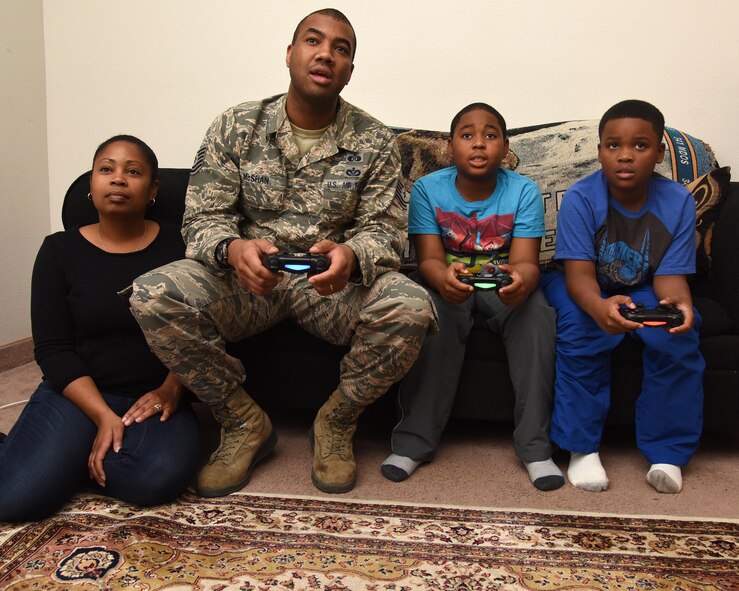 Tech. Sgt. Christopher McShan II, 341st Civil Engineer Squadron emergency management flight section chief, spends quality time with his family at their home at Malmstrom Air Force Base, Mont., Nov. 17, 2016. McShan is involved in his home life, but also work as well. (U.S. Air Force photo/Senior Airman Jaeda Tookes)

