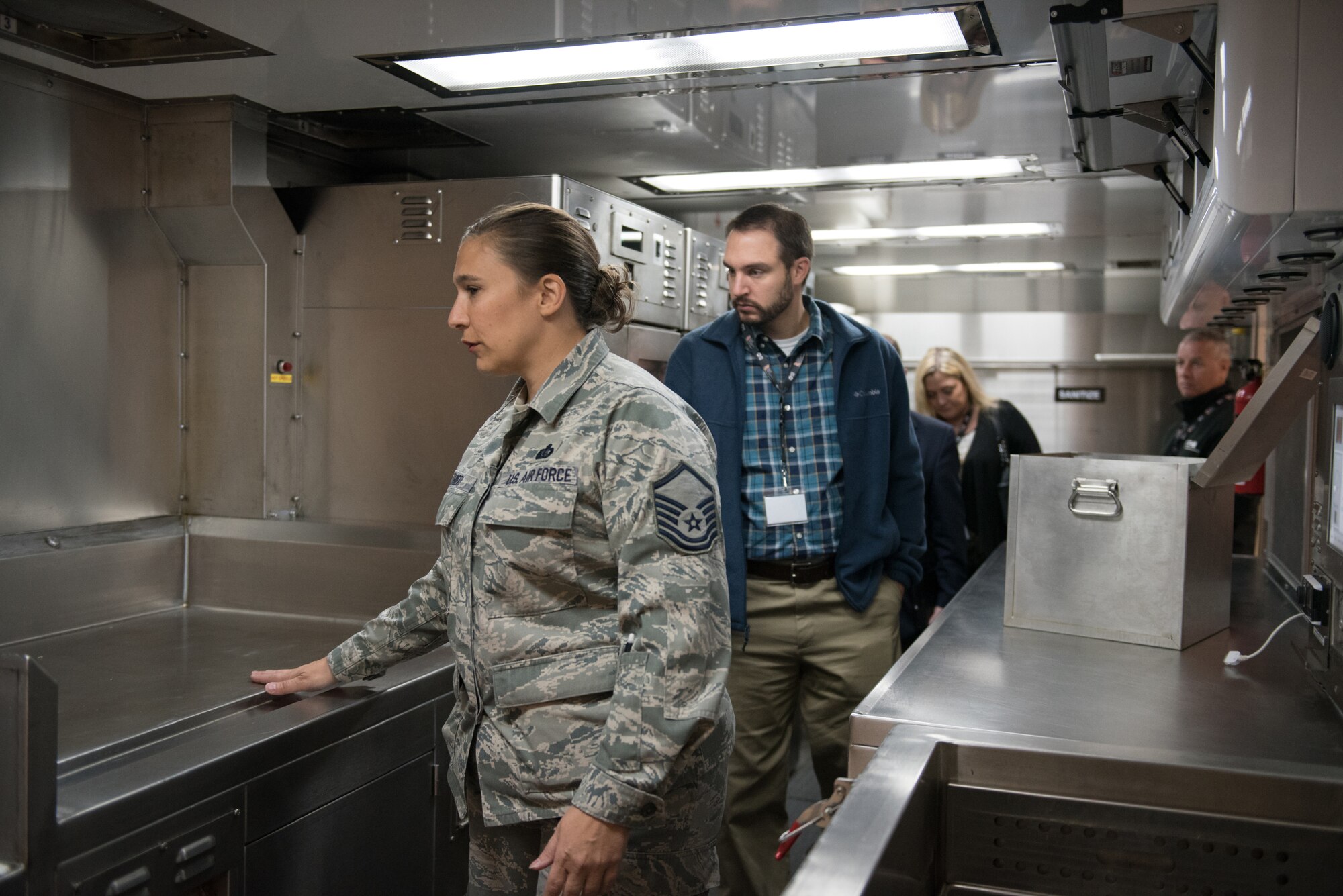 Master Sgt. Jennifer Thiery, services superintendent for the 123rd Force Support Squadron, shows civilian employers the inside of the Disaster Relief Mobile Kitchen Trailer during an Employer Support of the Guard and Reserve “Bosslift” at the Kentucky Air National Guard Base in Louisville, Ky., Oct. 26, 2016. The Bosslift gave employers an opportunity to learn more about what their employees do when serving as reservists in the Kentucky Air National Guard. (U.S. Air National Guard photo by Master Sgt. Phil Speck)