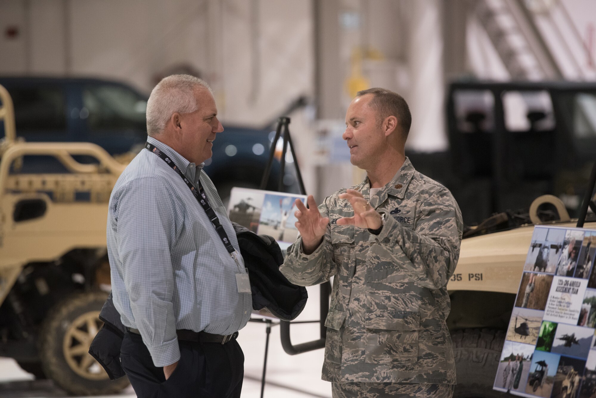 Maj. James Embry, director of operations for the 123rd Global Mobility Squadron, explains contingency response operations to Ivan Wood, global tooling business leader for GE Aviation, during an Employer Support of the Guard and Reserve “Bosslift” at the Kentucky Air National Guard Base in Louisville, Ky., Oct. 26, 2016. The Bosslift gave civilian employers an opportunity to learn more about what their employees do when serving as reservists in the Kentucky Air National Guard. (U.S. Air National Guard photo by Master Sgt. Phil Speck)