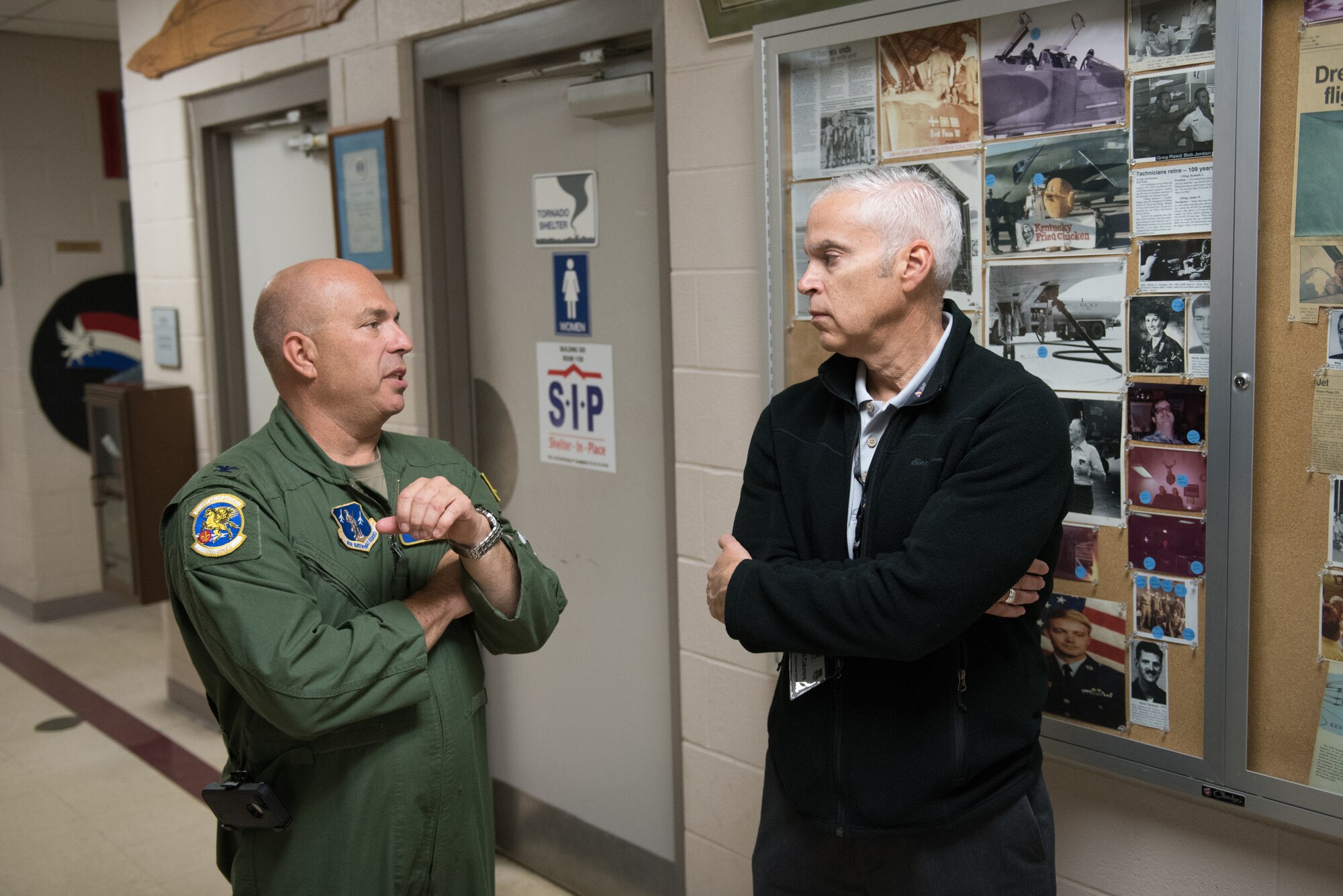 Col. Ken Dale, commander of the 123rd Maintenance Group, talks to Gilberto Cabrera, aircraft maintenance manager for United Parcel Service, during a tour of the Kentucky Air National Guard Base in Louisville, Ky., Oct. 26, 2016, as part of an Employer Support of the Guard and Reserve “Bosslift.” The event was designed to enhance civilian employers’ understanding of the unit’s mission and the work their employees do when serving as reservists in the Kentucky Air Guard. (U.S. Air National Guard photo by Master Sgt. Phil Speck)