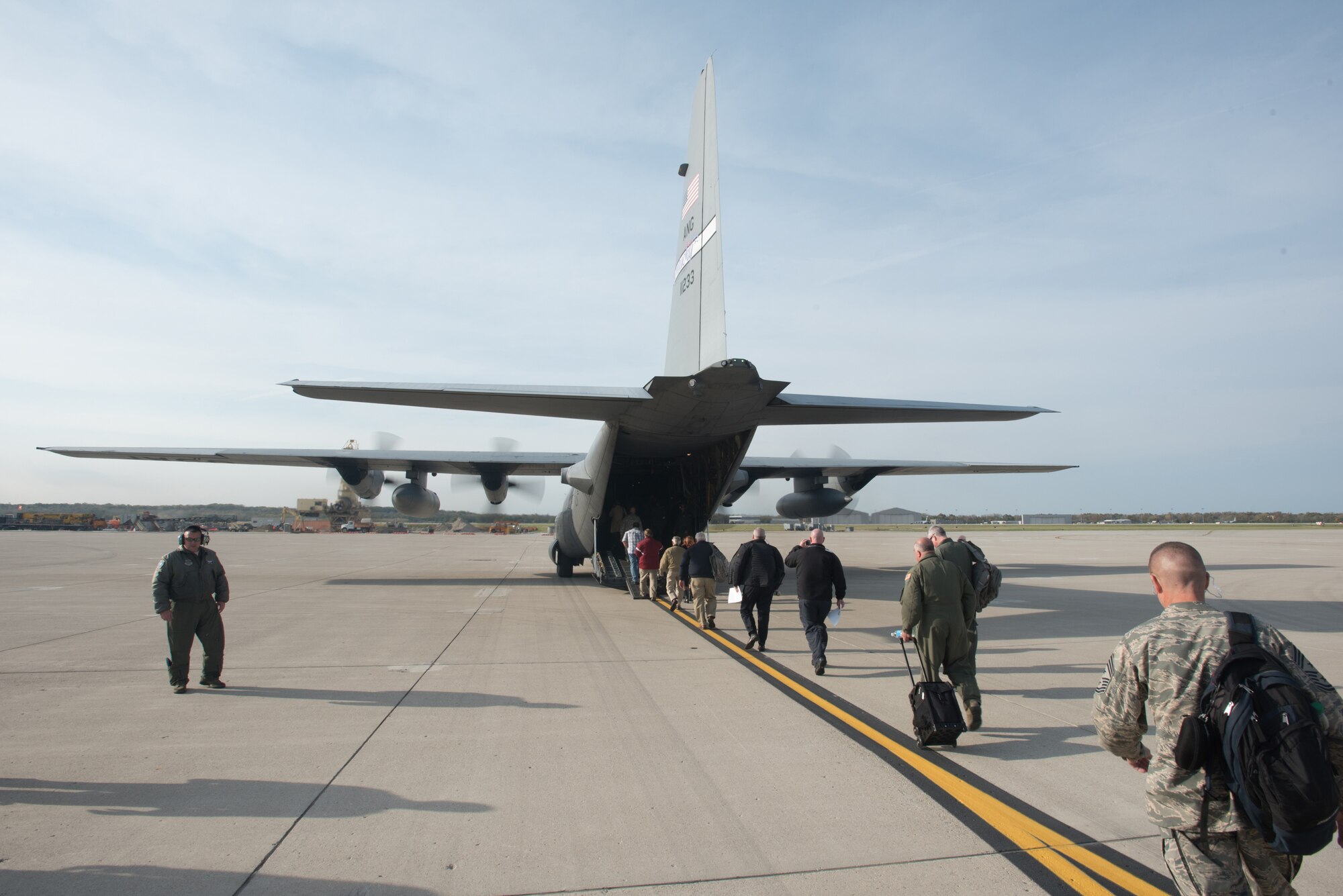 Civilian employers board a 123rd Airlift Wing C-130 Hercules aircraft at Wright-Patterson Air Force Base, Ohio, Oct. 26, 2016, as part of an Employer Support of the Guard and Reserve “Bosslift.” The employers were participating in an orientation flight which began at the Kentucky Air National Guard Base in Louisville, Ky., and was one component in a day of activities designed to enhance their understanding of the wing’s mission and the work their employees do when serving as reservists in the Kentucky Air Guard. (U.S. Air National Guard photo by Master Sgt. Phil Speck)
