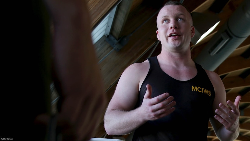Cpl. Aaron Rayburn speaks to Marines during a water survival advanced course at Marine Corps Air Station Cherry Point, N.C., Oct. 25, 2016. Rayburn, originally an air framer with Marine Transport Squadron 1, volunteered to become a search and rescue swimmer with the squadron. After the search and rescue mission for VMR-1 ended, he took his aquatic skills and applied them as a Marine Combat Instructor of Water Survival. Rayburn is a MCIWS with VMR-1.