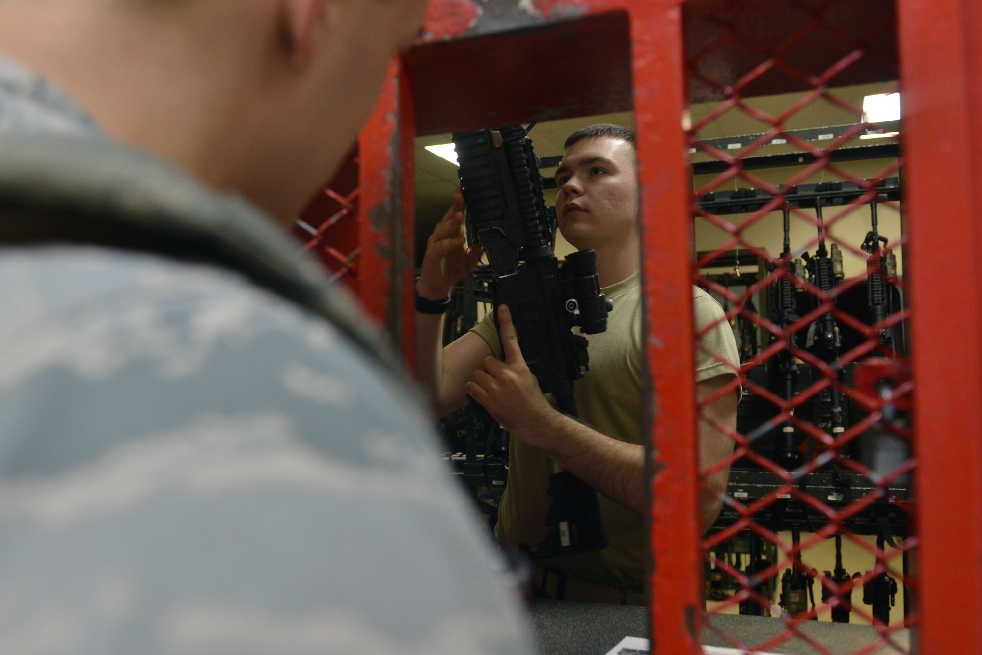 A U.S. Airman assigned to the 39th Security Forces Squadron prepares an M4 carbine for issue July 20, 2016, at Incirlik Air Base, Turkey. Security Forces Airmen report to the armory prior to duty for weapon and equipment issue. (U.S. Air Force photo by Senior Airman John Nieves Camacho)