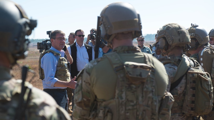 Defense Secretary Ash Carter speaks with the Air Force special operators during a visit to Eglin Air Force Base, Fla. It was the last stop on a three-state trip to meet with troops and assess readiness and effectiveness of training and equipment.
