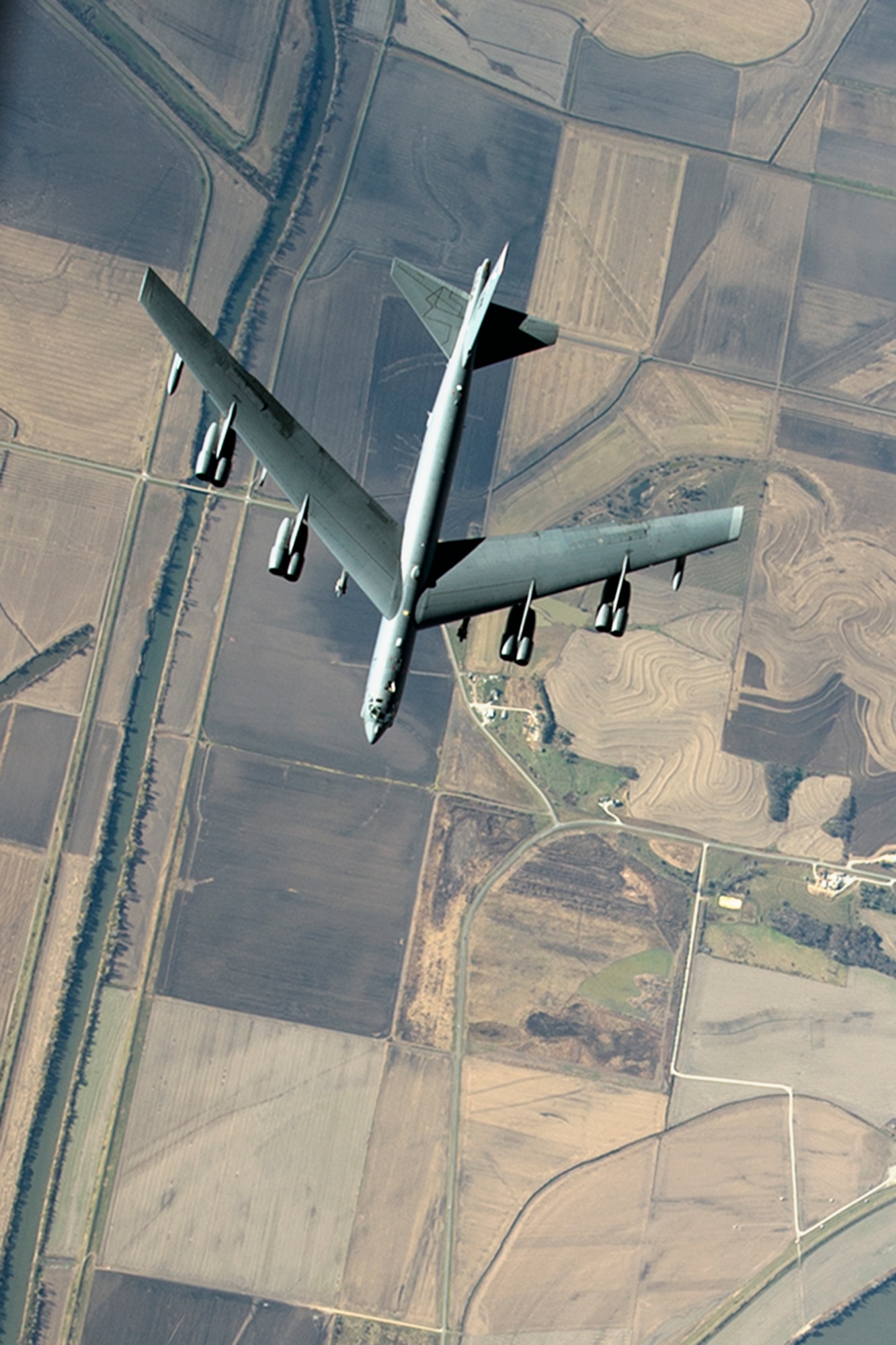 A U.S. Air Force B-52 Stratofortress from the 5th Bomb Wing, Minot Air Force Base, N.D., flies below a 434th Air Refueling Wing KC-135R Stratotanker during a refueling mission over the Midwest Nov. 16, 2016. During the flight, media representatives from central Indiana learned more about the mission of the 434th ARW and the capabilities of the B-52. (U.S. Air Force photo/Tech. Sgt. Benjamin Mota)
