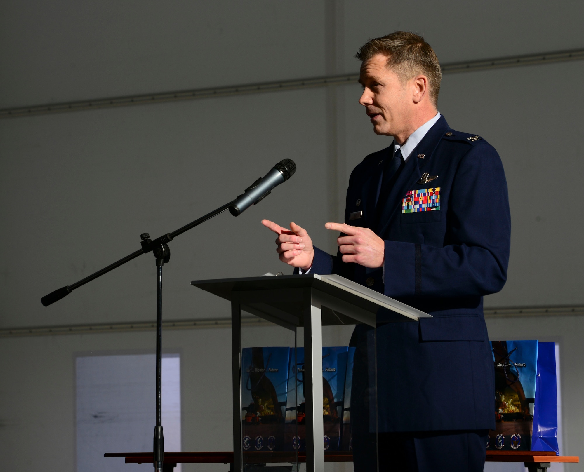 U.S. Air Force Col. Trevor Nitz, Heavy Airlift Wing commander, speaks during a C-17 Globemaster III hangar complex grand opening at Pàpa Air Base, Hungary on Nov. 17, 2016. The first-of-its-kind hangar complex provides space to wash and paint the three C-17s stationed at the HAW, and allows fuel cell, operational and routine maintenance to be performed at any time. (U.S. Air Force photo by Staff Sgt. Krystal Ardrey)