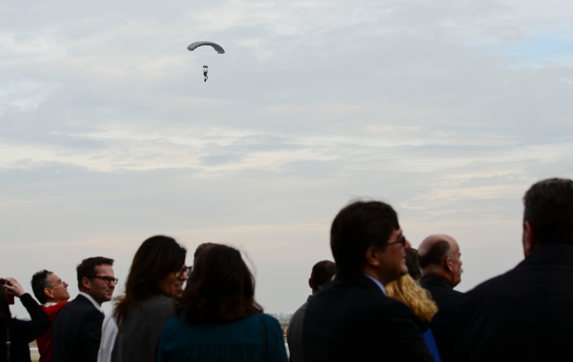A Swedish Armed Forces Parachute Unit paratrooper performs a parachute demonstration during the C-17 Globemaster III grand opening at Pàpa Air Base, Hungary on Nov. 17, 2016. The Swedish paratroopers demonstrated the HAWs ability to insert special forces units into hostile environments through their fleet of three C-17 Globemaster IIIs. (U.S. Air Force photo by Staff Sgt. Krystal Ardrey)