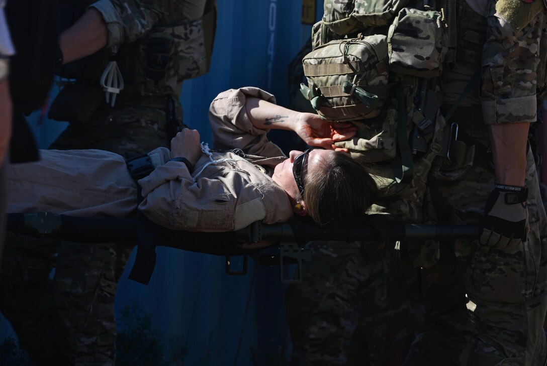 Special Operators from the 24th Special Operations Wing and 7th Special Forces group rescue a simulated hostage on Eglin Range, Fla., Nov. 17, 2016. Secretary of Defense Ash Carter was embedded with the team during the mission. (U.S. Air Force photo/Staff Sgt. Melanie Holochwost)