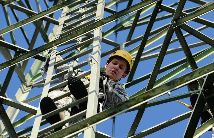 Senior Airman Joshua Russell, 52nd Operations Support Squadron airfield systems technician, climbs an air traffic control radio antenna at Ramstein Air Base, Germany, Nov. 14, 2016. The 86th Operations Support Squadron monitors, repairs and maintains all air traffic, landing, radio and weather systems at Ramstein. (U.S. Air Force photo by Airman 1st Class Savannah L. Waters)