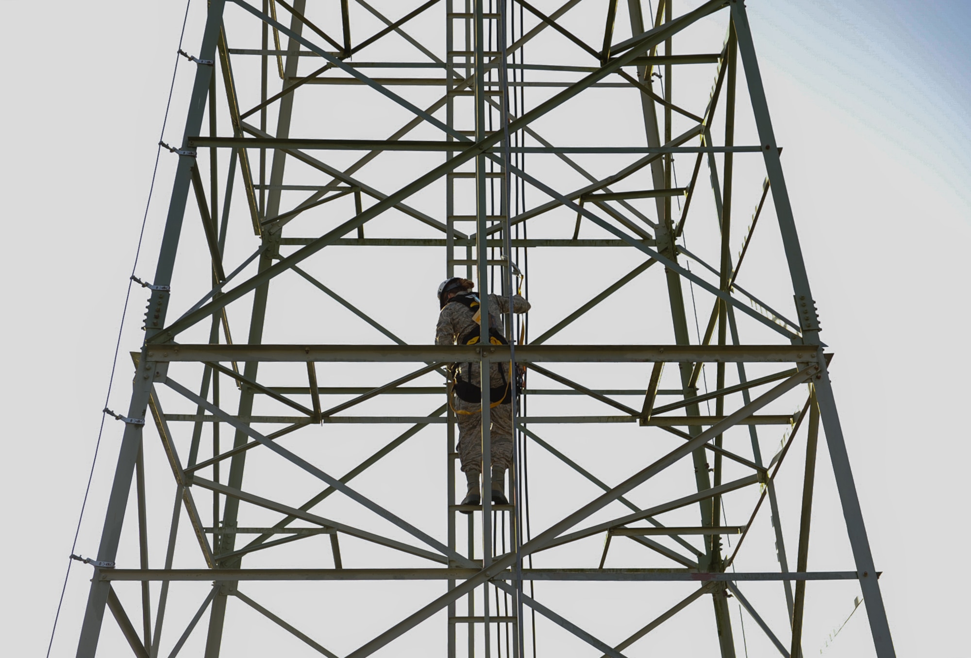 Senior Airman Nikki Erling, 86th Operations Support Squadron airfield systems technician, climbs air traffic control radio antennas at Ramstein Air Base, Germany, Nov. 14, 2016. The 86th Operations Support Squadron Air Traffic Control and Landing Systems flight maintains approximately 40dozens of air traffic control radio antennas across the base, furthering the mission to generate and employ airpower around the globe. (U.S. Air Force photo by Airman 1st Class Savannah L. Waters)