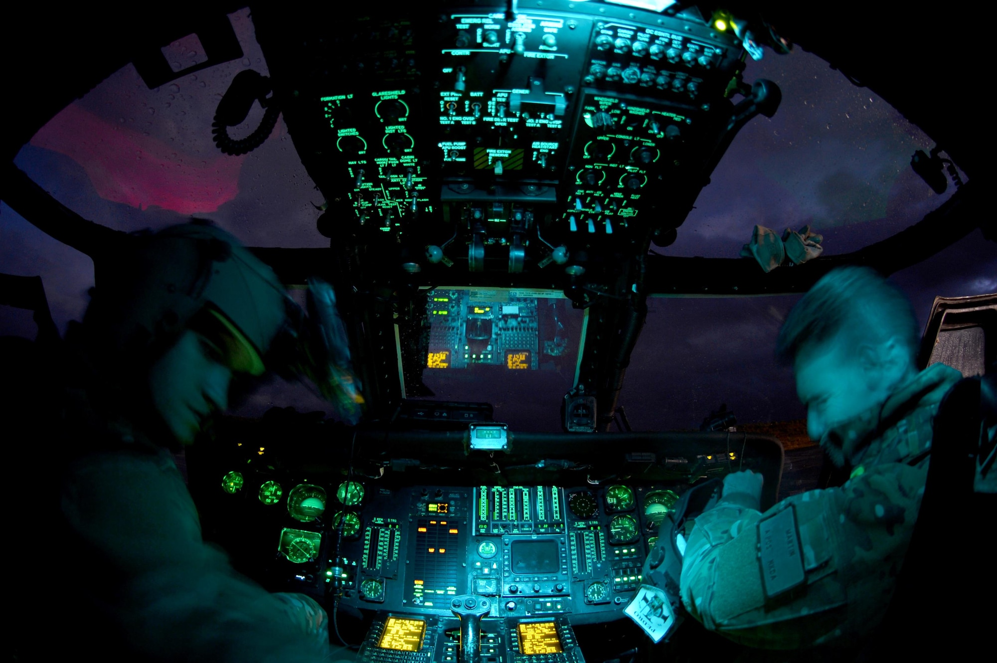 U.S. Air Force pilots assigned to the 56th Rescue Squadron at Royal Air Force Lakenheath, England, prepare mission systems Nov. 10, during Exercise Salamander at Cazaux Air Base, France. Participation in joint exercises allows U.S. forces to bolster relationships and interoperability with international partners. (U.S. Air Force photo/Master Sgt. Eric Burks)