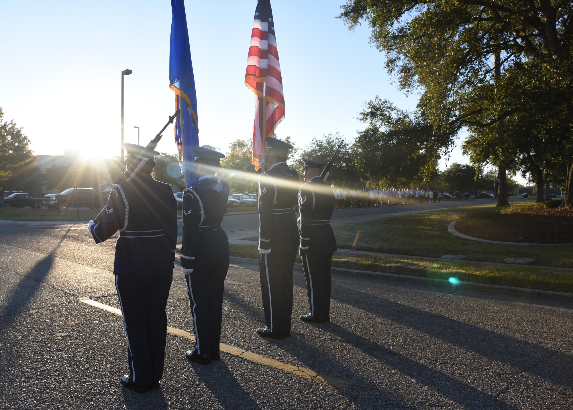 The Keesler Air Force Base Honor Guard posts the colors during the singing of the national anthem during an 81st Training Wing color run Nov. 17, 2016, on Keesler Air Force Base, Miss. The run was one of several events held throughout Dragon Week, which focuses on resiliency and teambuilding initiatives across the base. (U.S. Air Force photo by Kemberly Groue/Released)