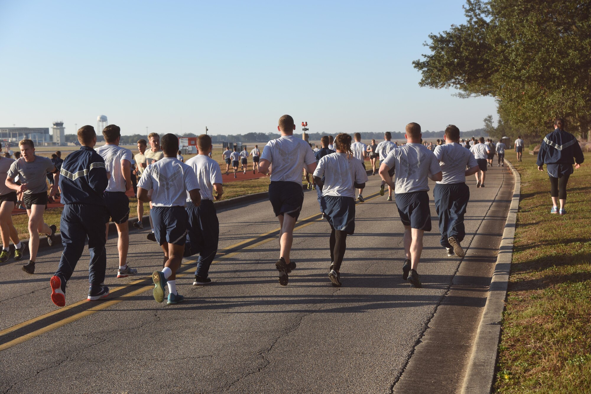 Keesler personnel participate in an 81st Training Wing color run Nov. 17, 2016, on Keesler Air Force Base, Miss. The run was one of several events held throughout Dragon Week, which focuses on resiliency and teambuilding initiatives across the base. (U.S. Air Force photo by Kemberly Groue/Released)