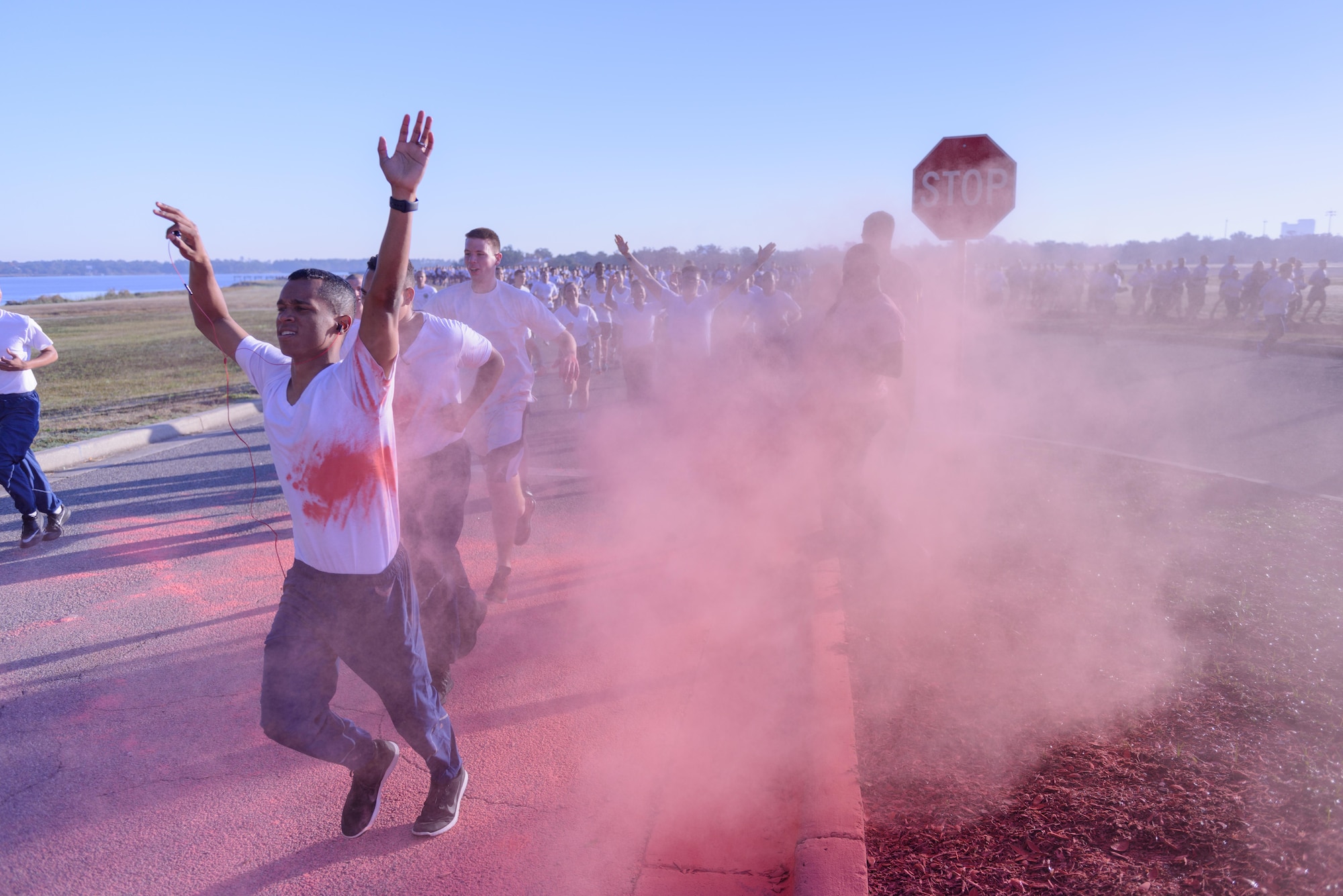 Keesler personnel participate in an 81st Training Wing color run at the Marina Park Nov. 17, 2016, on Keesler Air Force Base, Miss. The run was one of several events held throughout Dragon Week, which focuses on resiliency and teambuilding initiatives across the base. (U.S. Air Force photo by André Askew/Released)