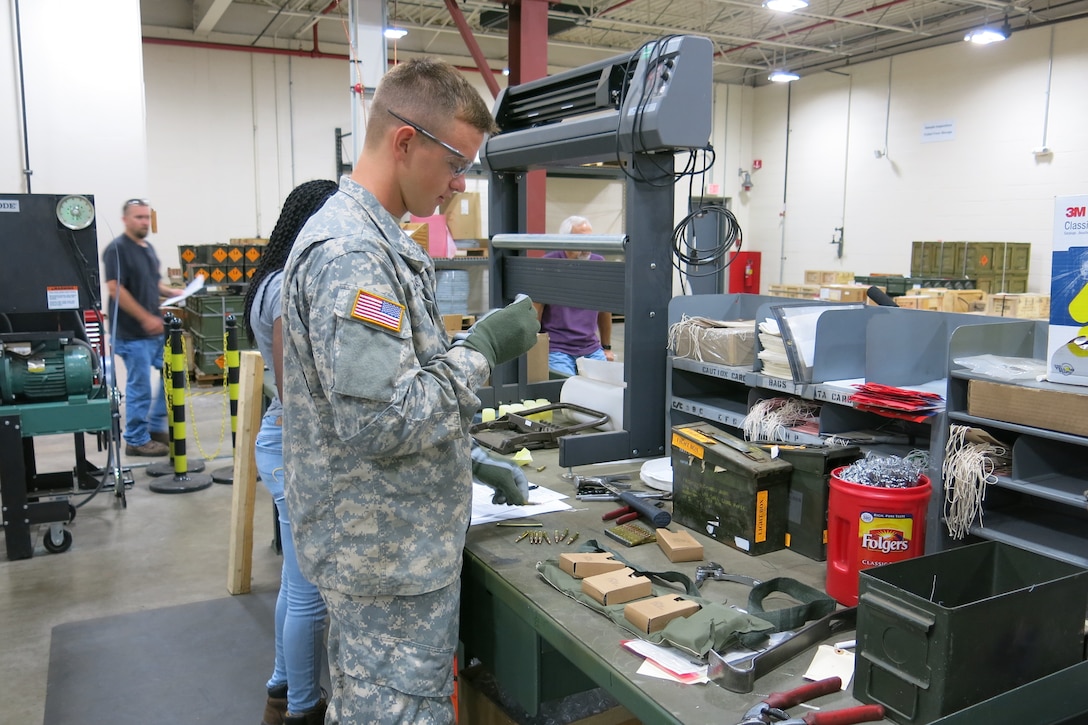 Reserve Soldiers from the 351st and 826th Ordnance Companies work inspection operations on July 12, 2016, in support of outload operations.