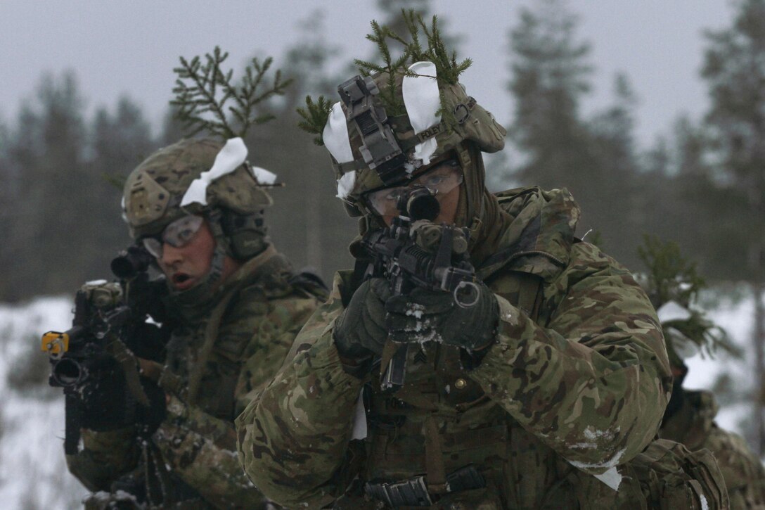 Paratroopers assigned to Able Company, 2nd Battalion, 503rd Infantry Regiment, 173rd Airborne Brigade, assault through a breach during team leader training at Tapa Training Area, Tapa, Estonia, Nov. 16, 2016. The platoon-level exercise sought to affirm each team leader’s capacity to tackle the complexities of a company-level combined arms live-fire exercise. Army photo by Sgt. Lauren Harrah