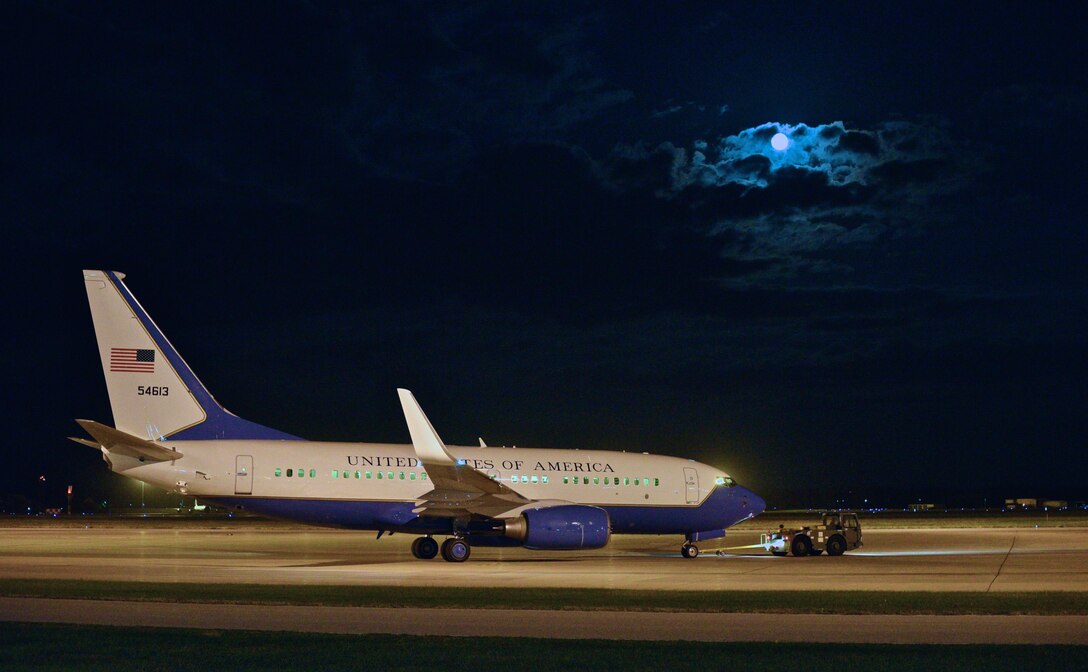 A 932nd Airlift Wing C-40C is towed under the evening light of the supermoon, Nov. 14, 2016 at Scott Air Force Base, Illinois.  The best time to see the supermoon had been in the early morning hours on the 14th of November. The 932nd AW is the only Air Force Reserve Command wing flying the C-40C, a distinguished visitor aircraft. (U.S. Air Force photo by Christopher Parr)