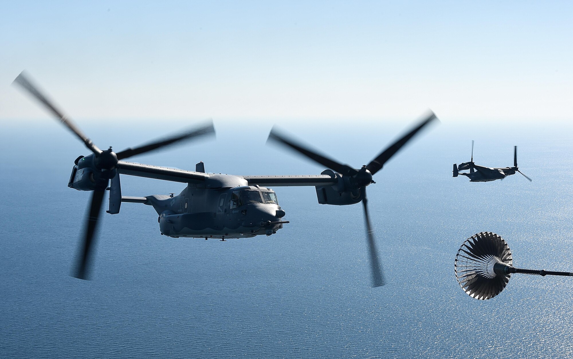 A CV-22 Osprey tiltrotor aircraft assigned to the 8th Special Operations Squadron makes its approach for a tiltrotor air-to-air refueling with an MC-130H Combat Talon II aircraft assigned the 15th SOS over the Gulf of Mexico, Nov. 17, 2016. Secretary of Defense Ash Carter visited with Air Force Special Operations Command Air Commandos, participated in a Joint Assault Force with Special Tactics teams and flew on a CV-22 during his visit to Hurlburt Field, Fla. (U.S. Air Force photo by Senior Airman Jeff Parkinson)