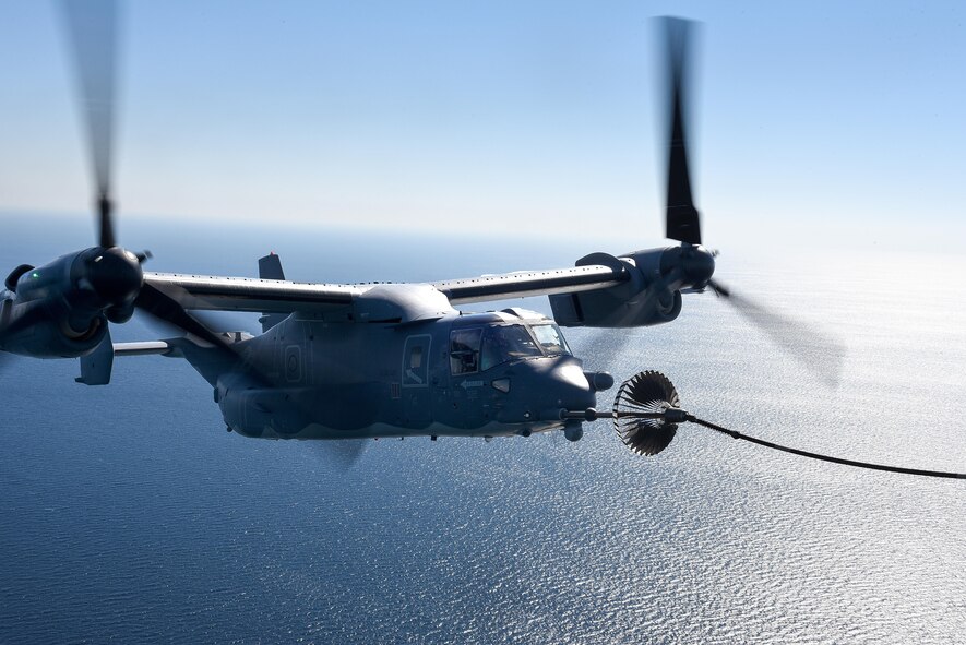 A CV-22 Osprey tiltrotor aircraft assigned to the 8th Special Operations Squadron receives fuel from an MC-130H Combat Talon II aircraft assigned the 15th SOS over the Gulf of Mexico, Nov. 17, 2016. The 8th and 15th SOS participated in a tiltrotor air to air refueling demonstration for Secretary of Defense Ash Carter during his visit to Hurlburt Field, Fla. (U.S. Air Force photo by Senior Airman Jeff Parkinson)