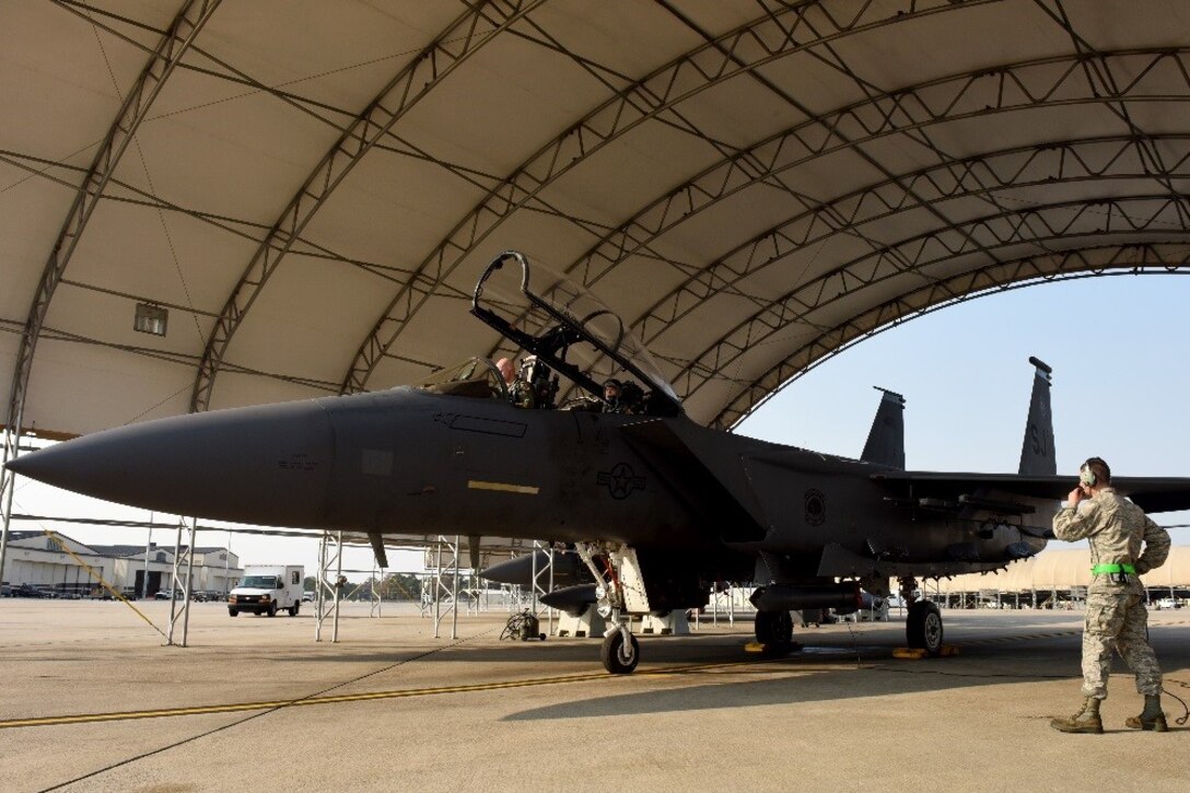 Gen. Petr Pavel, NATO military committee chairman, and Maj. Adam Mattheis, 335th Fighter Squadron pilot, prepare to take off in an F-15E Strike Eagle, Nov. 15, 2016, at Seymour Johnson Air Force Base, North Carolina. Mattheis recently returned from a deployment in which 2,000 bombs were dropped over enemy territory, and more than 10 high-value Islamic State of Iraq and Levant individuals were killed. (U.S. Air Force photo by Airman Miranda A. Loera)