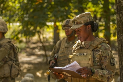 Army Drill Sergeant, Staff Sgt. Akia Sieben, an Army drill sergeant with basic combat training Company A, 1st Battalion, 61st Infantry Regiment at Fort Jackson, S.C., grades Soldiers on the hand grenade assault course, Oct. 19. (U.S. Army Reserve photo by Sgt. Stephanie Hargett/ released)