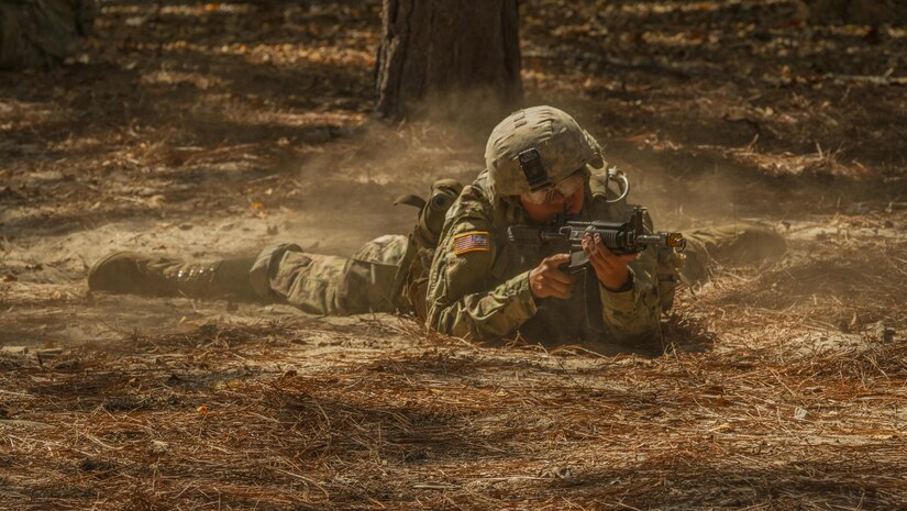 Pvt. Diego Garcia, an Army Reserve Soldier in basic combat training with Company A, 1st Battalion, 61st Infantry Regiment at Fort Jackson, S.C., pulls security at the hand grenade assault course, Oct. 19. (U.S. Army Reserve photo by Sgt. Stephanie Hargett/ released)