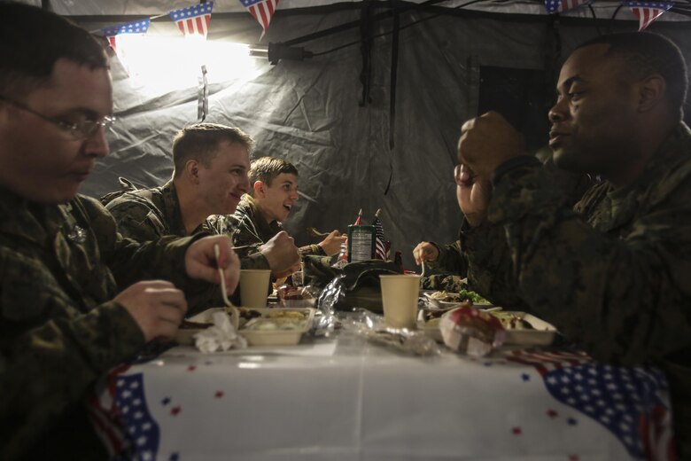 After the 2nd Marine Logistics Group squad competition Marines and Sailors enjoy a “Warriors Meal” at Camp Lejeune, N.C., Nov. 17, 2016. Marines from Food Service Company prepared and served the meal as part of their own competition for the W.P.T. Hill award. They were judged on their cleanliness, recipe compliance, teamwork, quality of food and execution. The Marines are with Food Service Company, Headquarters Regiment and other 2nd MLG units. (U.S. Marine Corps photos by Lance Cpl. Miranda Faughn)