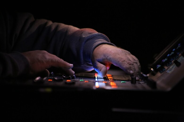 A audio technician member of the stage crew adjusts sound levels during the 8th annual Guitar Pull at Marine Corps Air Station Cherry Point, N.C. Nov. 16, 2016. More than 1,800 Marines, Sailors and members of the community came together to enjoy a free concert with musical artists like Trace Adkins, Jerrod Niemann, Josh Turner and more. The event brought forth an opportunity for service members and locals to interact with each other in a unique environment. (U.S. Marine Corps photo by Sgt. N.W. Huertas/ Released)