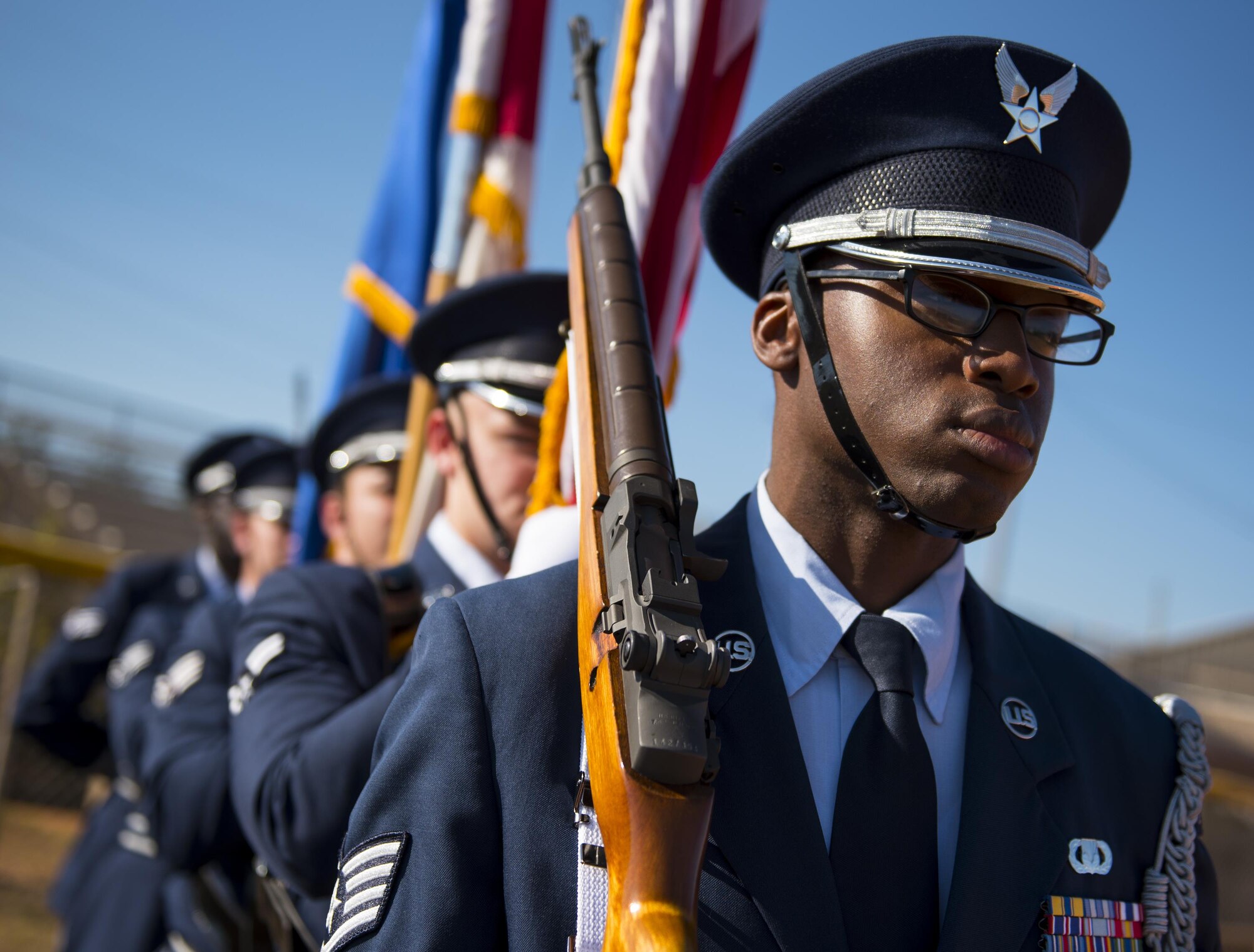 Staff Sgt. Jeremy Wortham waits to lead in an Honor Guard flag detail to a ceremony Nov. 16, at Eglin Air Force Base, Fla. In 2016, the base's honor guard teams traveled 190,823 miles to complete 458 details between 20 counties and two states.  (U.S. Air Force photo/Samuel King Jr.)

