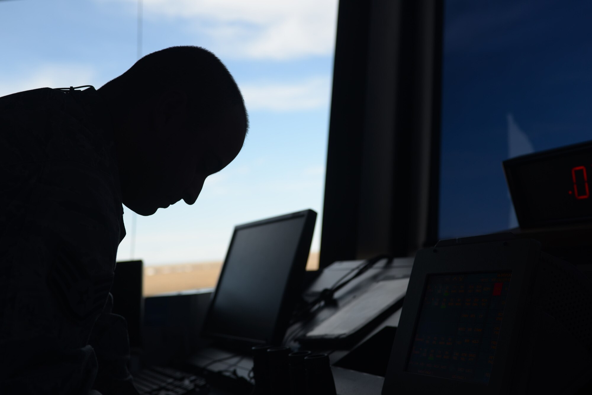 Staff Sgt. Yoendri Reinosa, an air traffic controller assigned to the 28th Operations Support Squadron, ensures an aircraft takes off safely at Ellsworth Air Force Base, S.D., Nov. 16, 2016. The job can be a challenge because controllers work with such a limited airspace, standing at five miles in radius surface up to 5,000 feet main sea level. (U.S. Air Force photo by Airman 1st Class Donald C. Knechtel)
