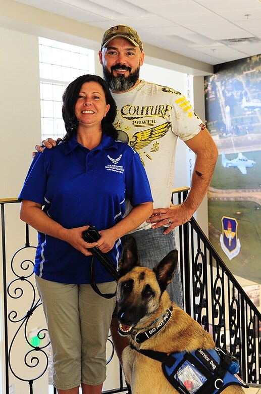 Retired Master Sgts. Lisa Hodgden and Chris Aguilera, U.S. Air Force Wounded Warriors, pause for a photo during their visit Nov. 16, 2016, at Columbus Air Force Base, Mississippi. The two retired master sergeants visited Team BLAZE to speak of the importance of resiliency and how they got through their traumatic experiences Nov. 15 – 18. They encouraged others to seek assistance when needed and participated in several events to meet Columbus AFB personnel face-to-face. (U.S. Air Force photo by Senior Airman Kaleb Snay)