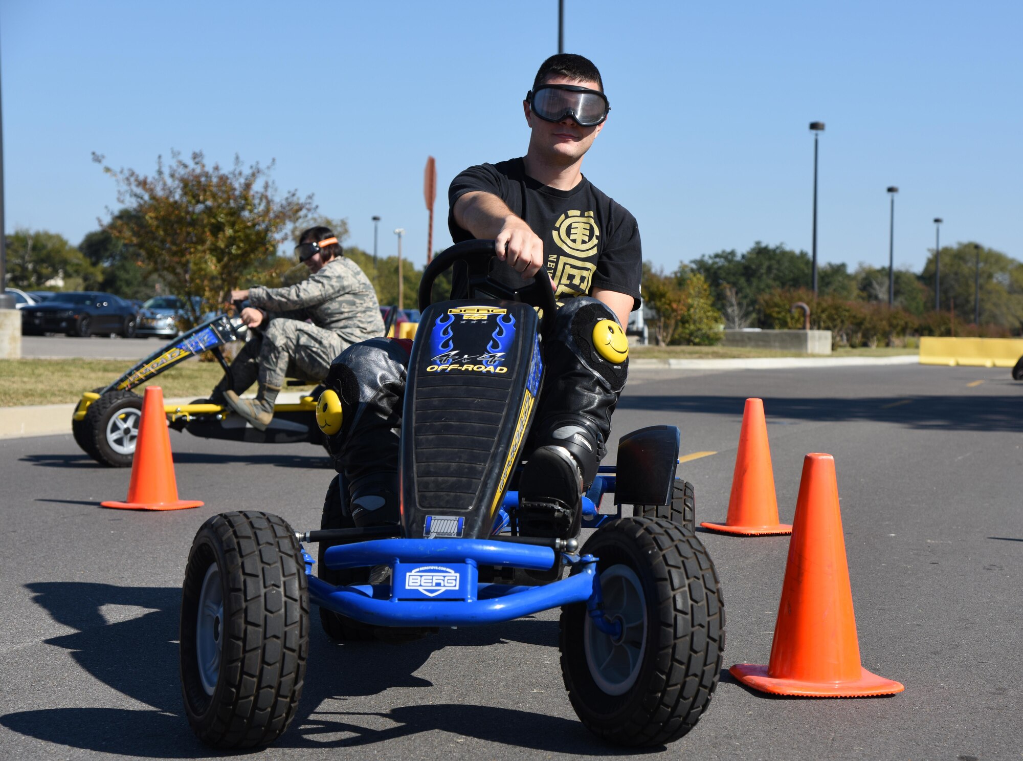 Staff Sgt. Michael Spears, 81st Dental Squadron dental assistant, operates an off-road all-terrain vehicle while wearing “drunk goggles” during Dragon Fest Nov. 17, 2016, on Keesler Air Force Base, Miss. Dragon Fest was the final event held for Dragon Week, which focused on resiliency and teambuilding initiatives across the base. (U.S. Air Force photo by Kemberly Groue)