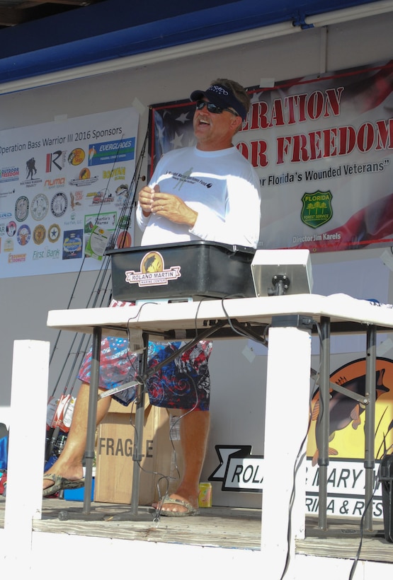 CLEWISTON, Fla. (Nov. 6, 2016) Central Command (CENTCOM) communications branch (J6) chief, Thomas Loftis welcomes guests to the Operation Bass Warrior fishing tournament.Loftis organized the event with a network of friends and family as a way of giving back to those who served and sacrificed.(Courtesy photo)