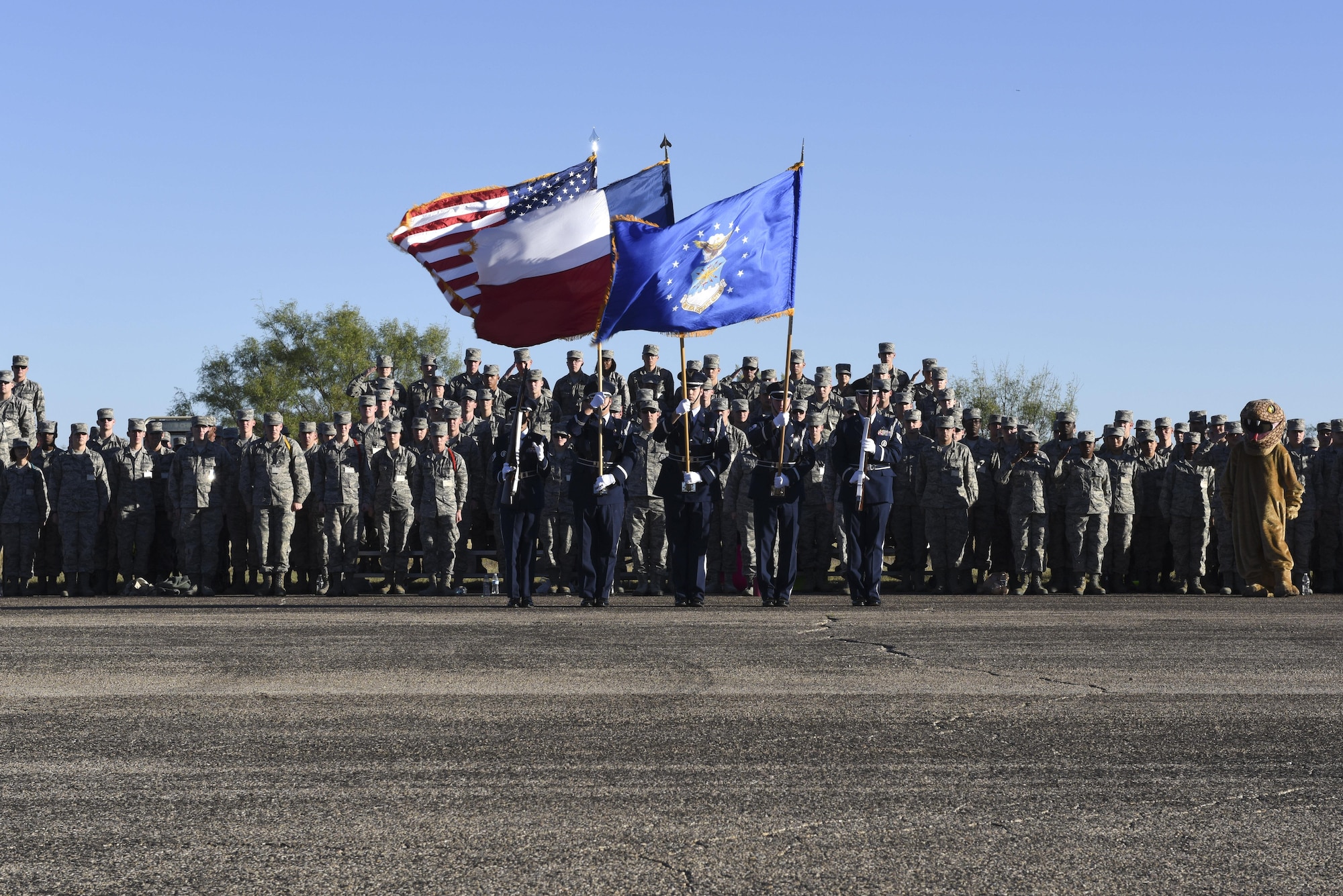 U.S. Air Force Goodfellow Honor Guard present the colors at the flight line on Goodfellow Air Force Base, Texas, Nov. 16, 2016. The flags symbolized the start of the 17th Training Group Drill Competition. (U.S. Air Force photo by Airman 1st Class Chase Sousa/Released)