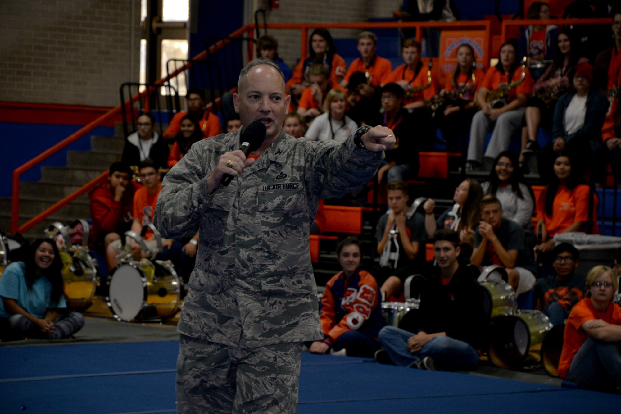 U.S. Air Force Col. Michael Downs, 17th Training Wing Commander, speaks at a school pep-rally at Central High School in San Angelo, Texas, Nov. 18, 2016. Downs presented a flag flown over Goodfellow Air Force Base headquarters to the San Angelo Central High School football team as they enter the second round of the Texas state football playoffs. (U.S. Air Force photo by Airman 1st Class Randall Moose/Released)  