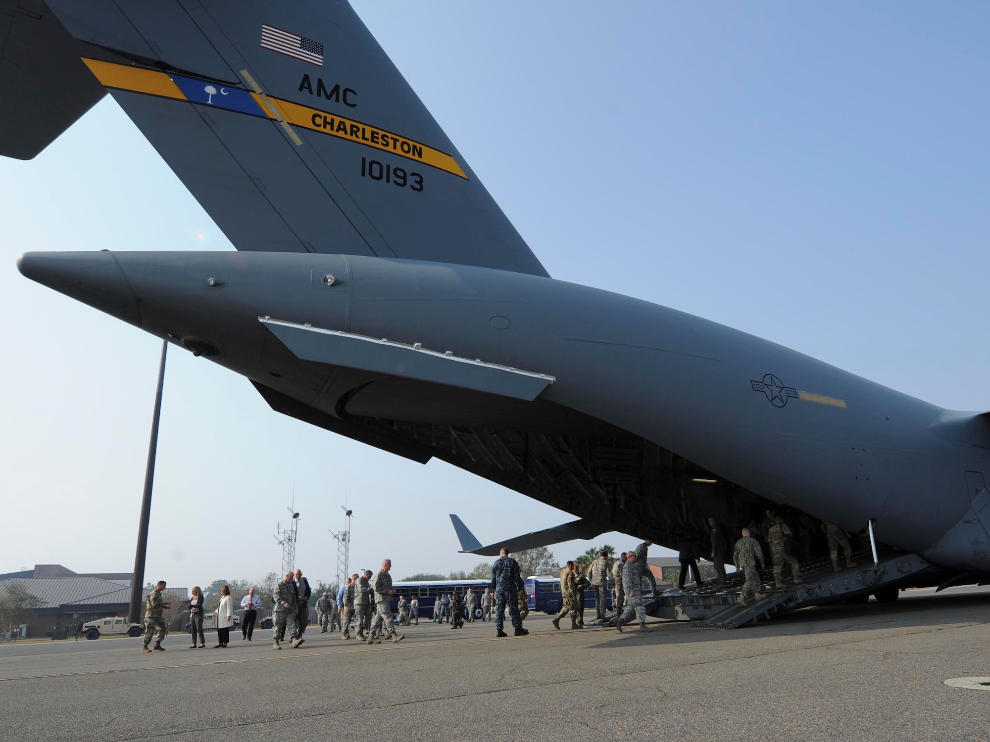 Key leaders from U.S. Transportation Command (USTRANSCOM) board a C-17 Globemaster III for a sortie during the USTRANSCOM Component Commanders conference here, Nov. 15, 2016. McDew and other key leaders from USTRANSCOM met to discuss common themes across the command.